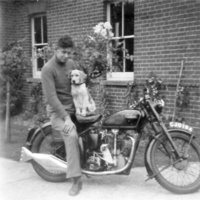 John Ruffles, Sally the dog on the Bellaset 350 outside the police house.